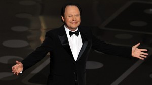 Comedian Billy Crystal arrives on stage
