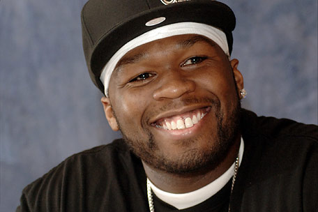 Rapper 50 Cent Tweets I Need a Record Deal 50 cent tattoo gun tattoos