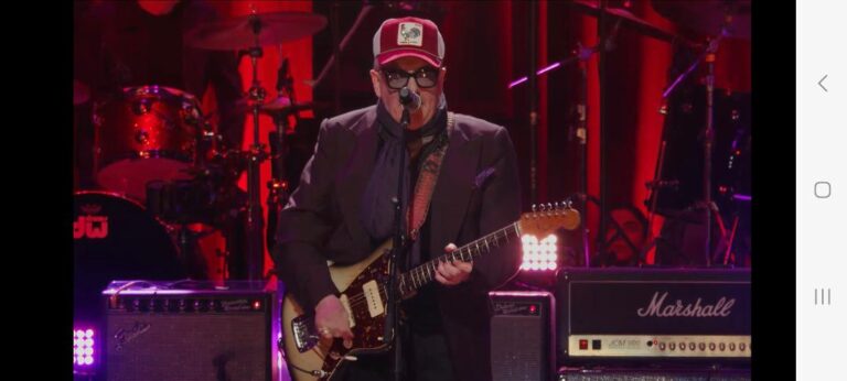 Paul Simon, Elvis Costello, Susannah Hoffs, Warren Haynes, Trombone Shorty Headline 10th Annual Love Rocks Show With a Bang (Video)